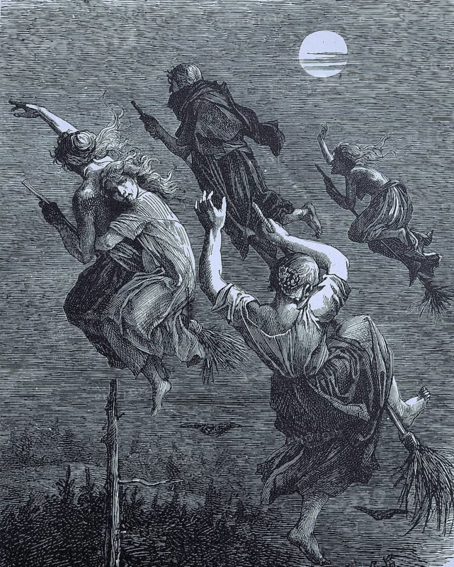 Witches riding a broom through the night