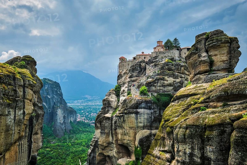 Monastery of Varlaam in famous greek tourist destination Meteora in Greece on sunset with scenic scenery landscape