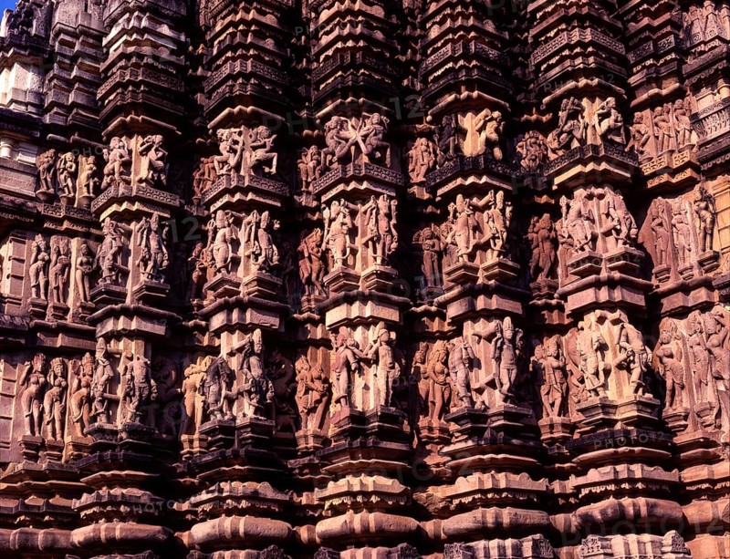Sculptures on the exterior of the Duladeo temple walls in Khajuraho