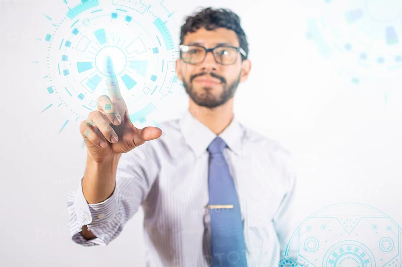 Businessman touching holographic icons