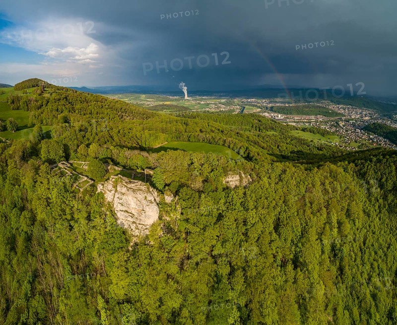 Passing thunderstorm with rainbow
