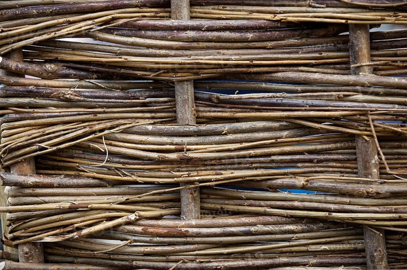 Hurdle made of traditionally woven willow branches