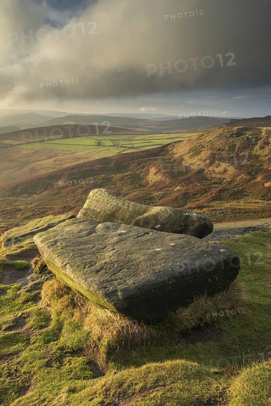 View from Gritstone rocks onto moorland habitat in the evening sun