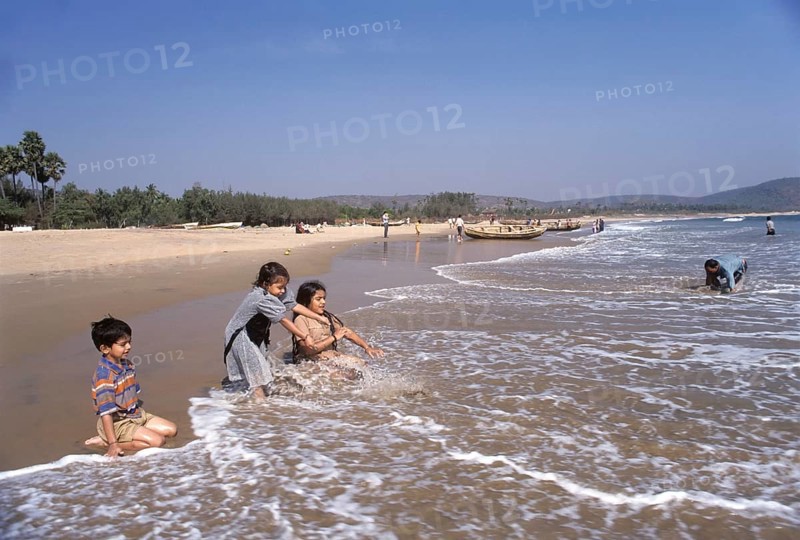 Children playing in Rishikonda beach in Visakhapatnam