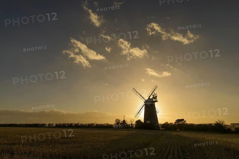 View of tower mill silhouetted in late evening