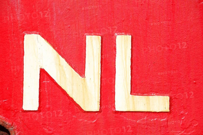 Country sign Netherlands on a red ship's side