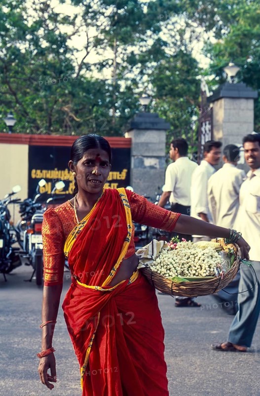 A Woman selling flowers near VOC Park at Coimbatore