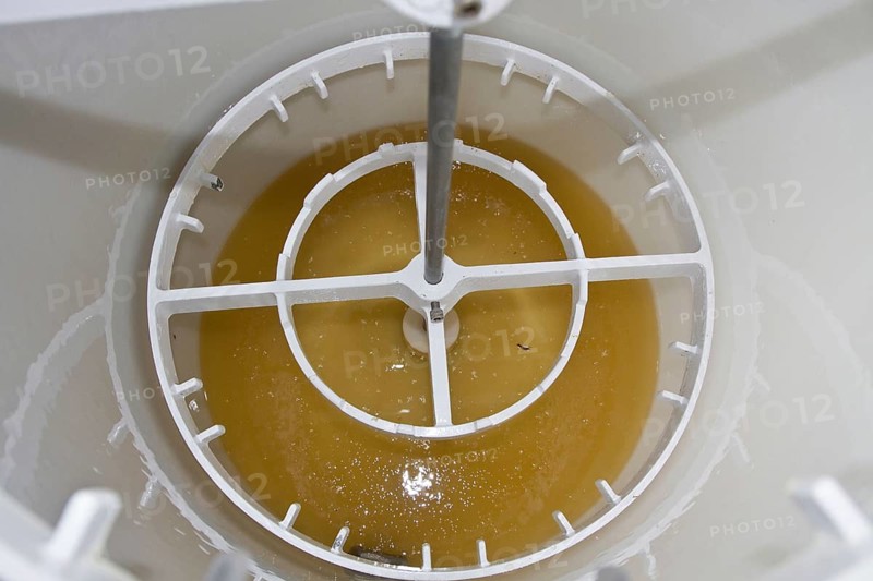 A look into the centrifugal drum after removing the honeycomb frames shows the freshly centrifuged