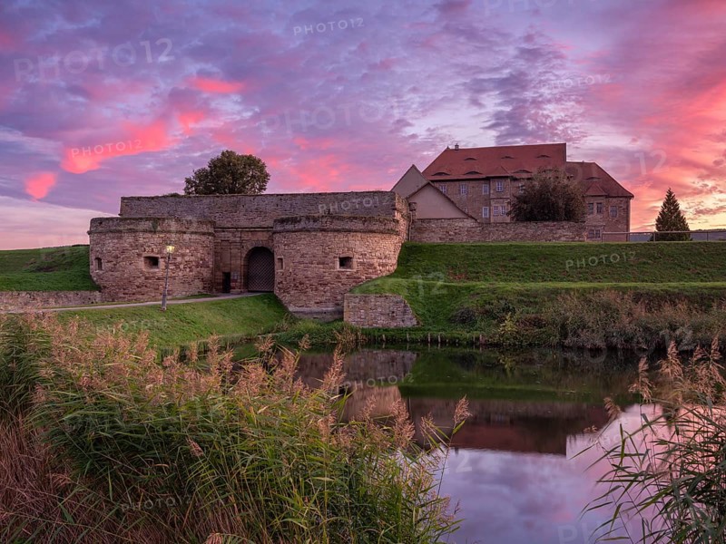 Heldrungen moated castle and fortress at sunset