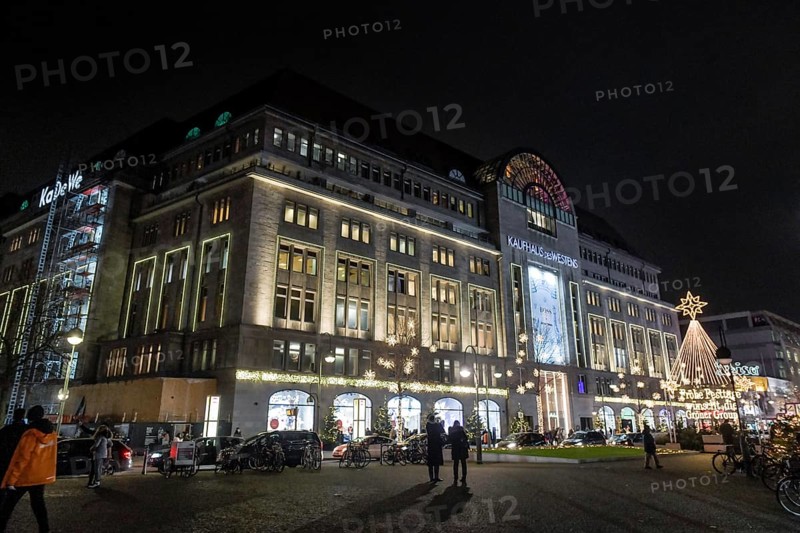 Kadewe from outside in the glow of lights. Christmas shopping on Tauentzien am Schoeneberg