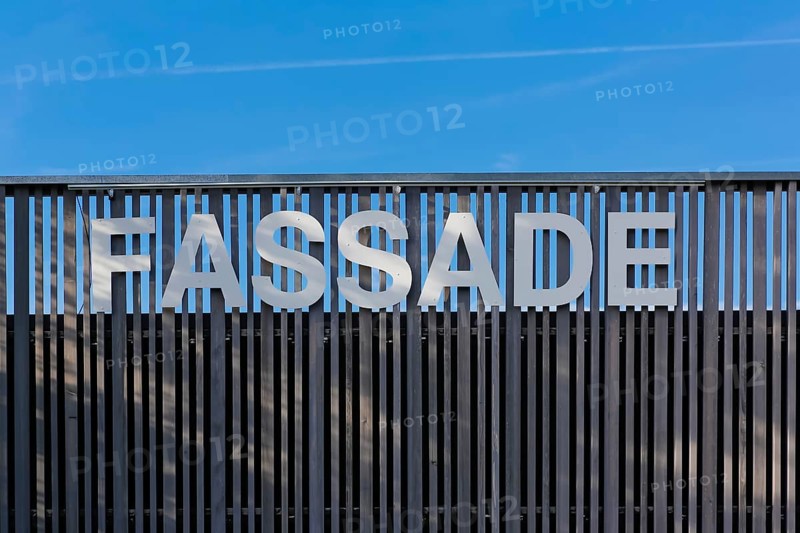 Lettering facade on wooden palisade