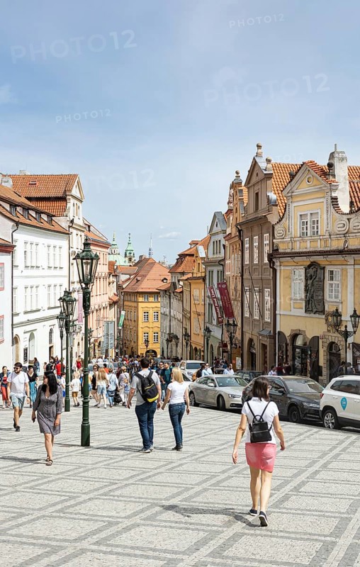 Tourists and colourful houses in the Lesser Quarter of Prague
