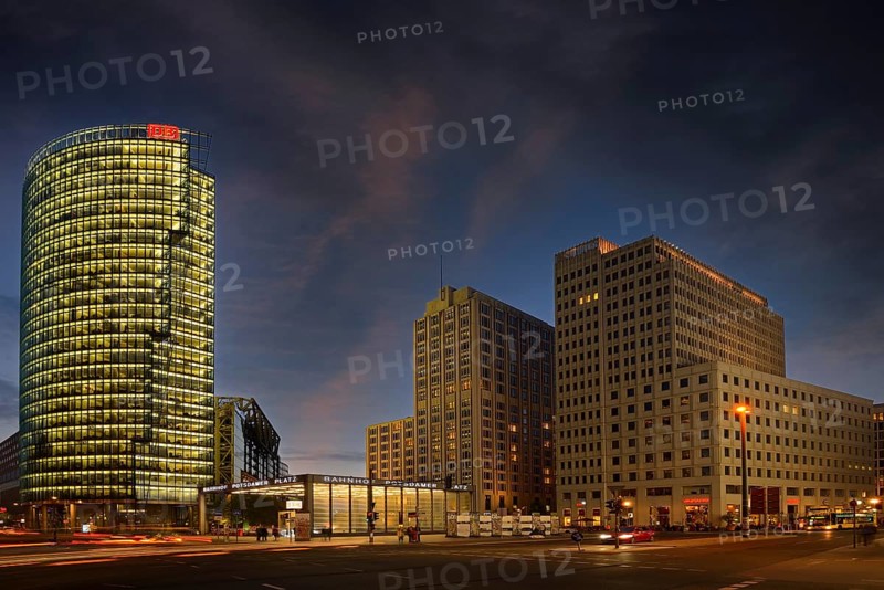 Bahntower on the left and Beisheim-Center with Ritz Carlton Hotel on the right in the evening at Potsdamer Platz