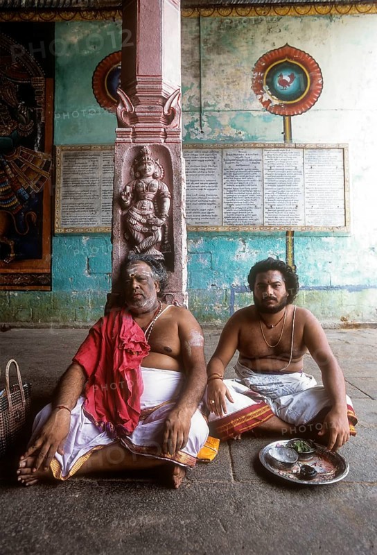 Priest sitting in the corridor of the Vaitheeswaran Temple
