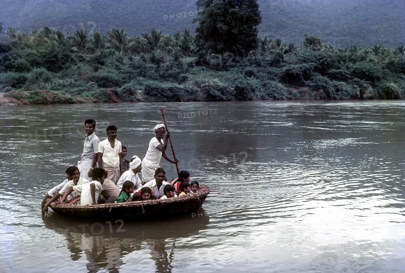 People enjoying Coracle Ride in River Bhavani at Nellithurai near Mettupalayam