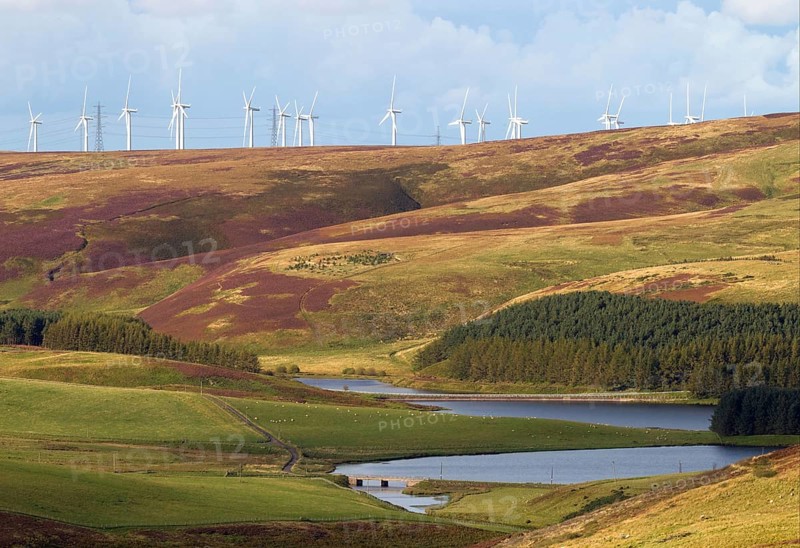 Wind turbines on the hill above the reservoir