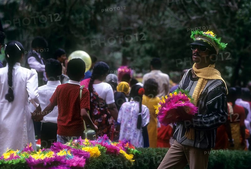 Colourful hat seller at Sim's park