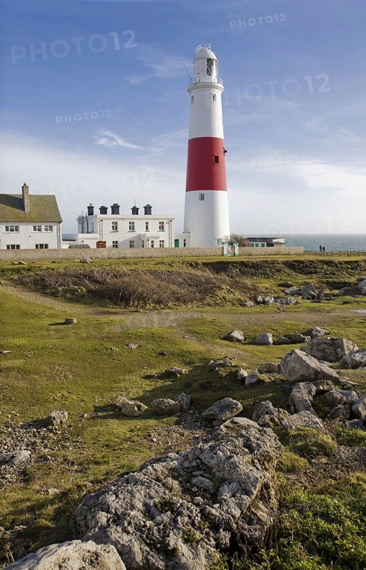 View of red and white painted lighthouse