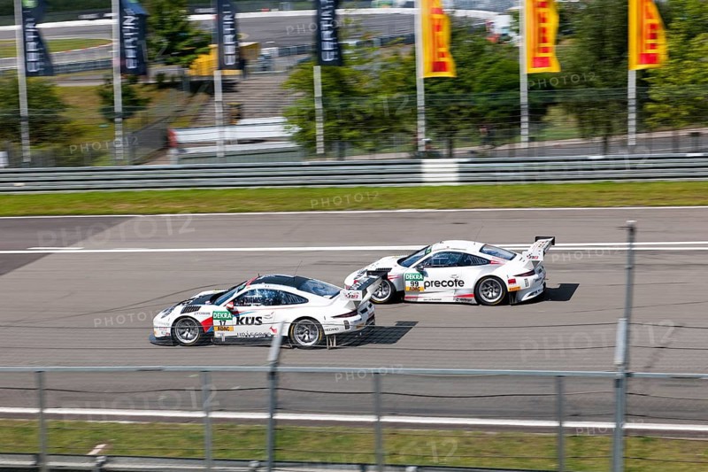 Two Porsche GT3s battle it out at Nuerburgring race track