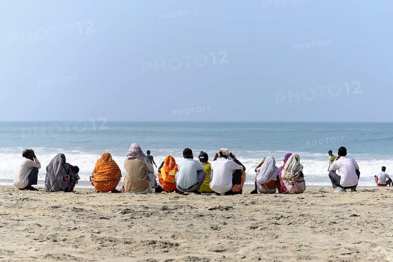 Holidaymakers on the beach of Kovalam