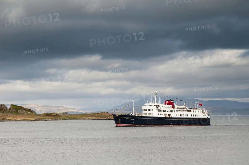 Cruise ship Hebridean Princess sails past the island on her way into Oban Harbour