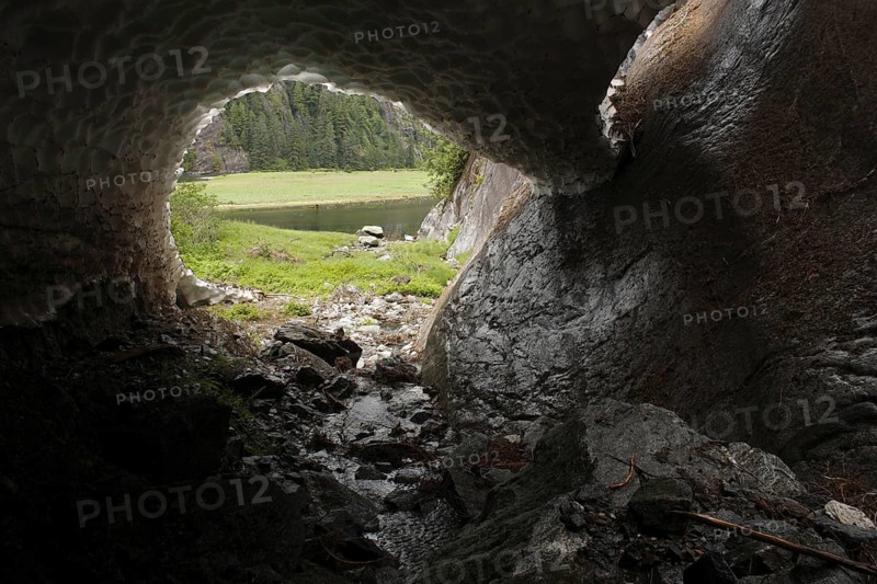 Melt hole under snow patch