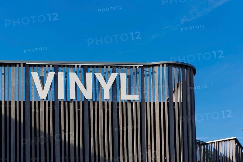 Vinyl lettering on wooden palisade