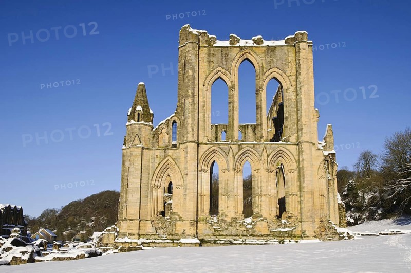 View of the ruins of a Cistercian abbey in the snow