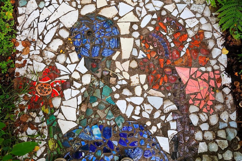 Walkway paved with broken pottery