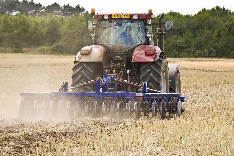 Case tractor with disc harrows