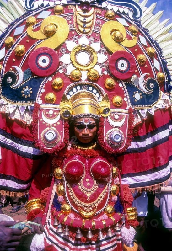 Theyyam dancer in Kavadiyattam in Athachamayam celebration in Thripunithura during Onam near Ernakulam