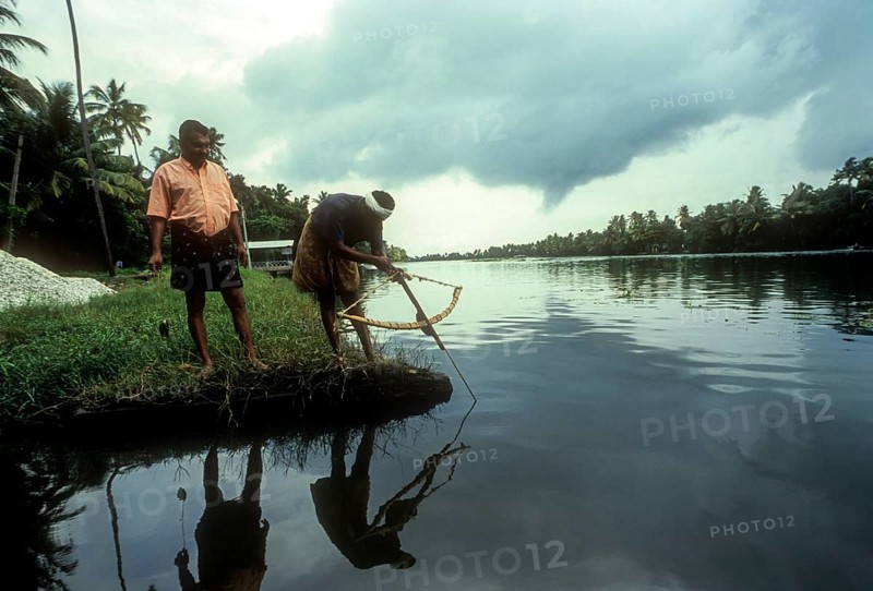 Fishing with bow and arrow