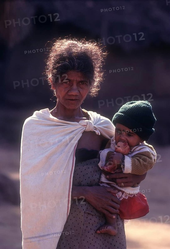 Jenu Kurumba lady with her babe in Bandipur