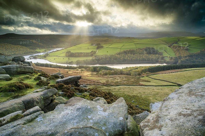 View over cliffs towards reservoir