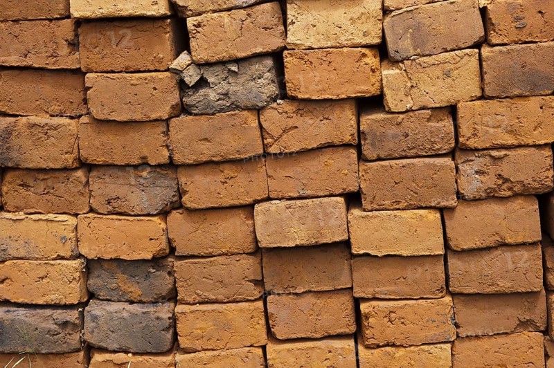 Sun-dried bricks stacked and ready for use