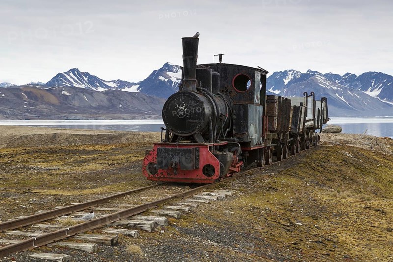 Historic coal mining stream train in tundra