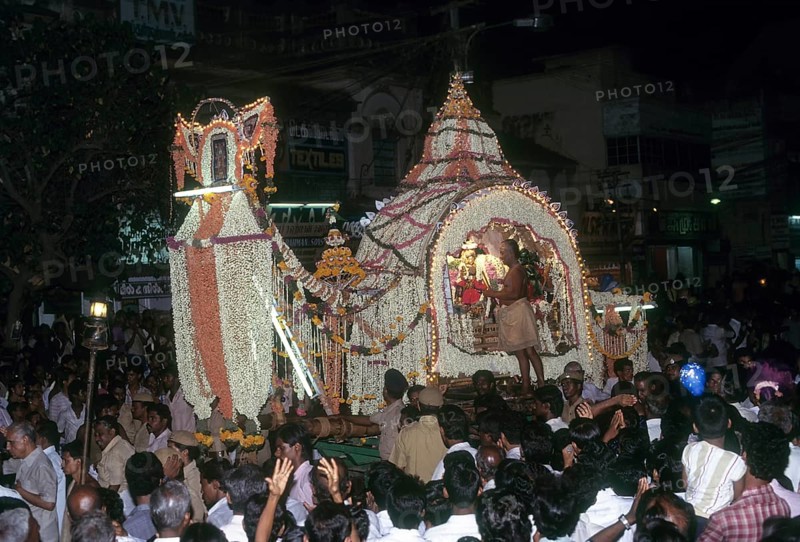 Goddess Meenakshi in a flower Palanquin going in a procession after her wedding