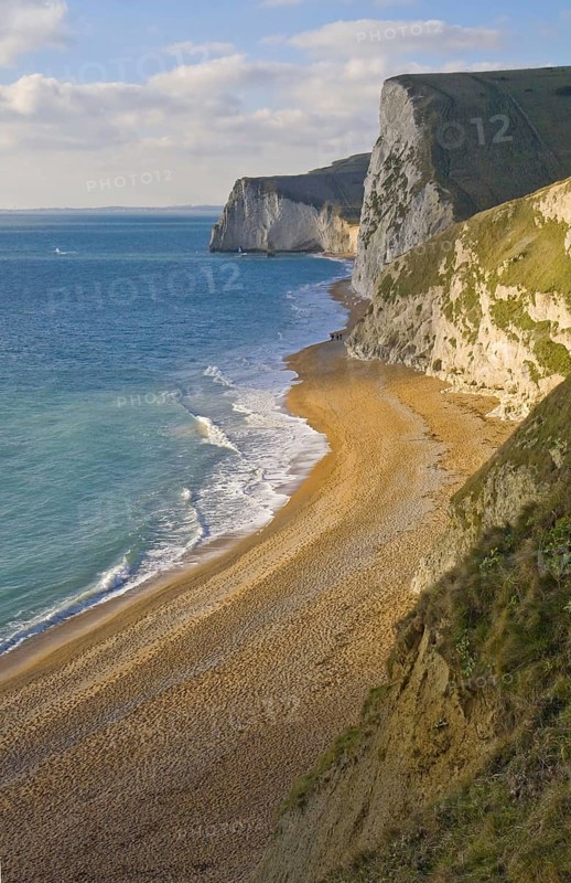 View of chalk cliffs and shingle beach