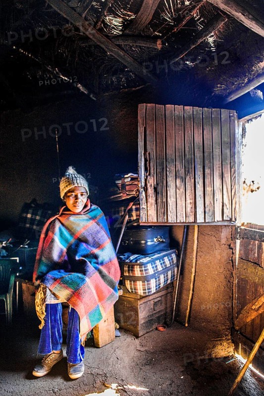 Woman in hut