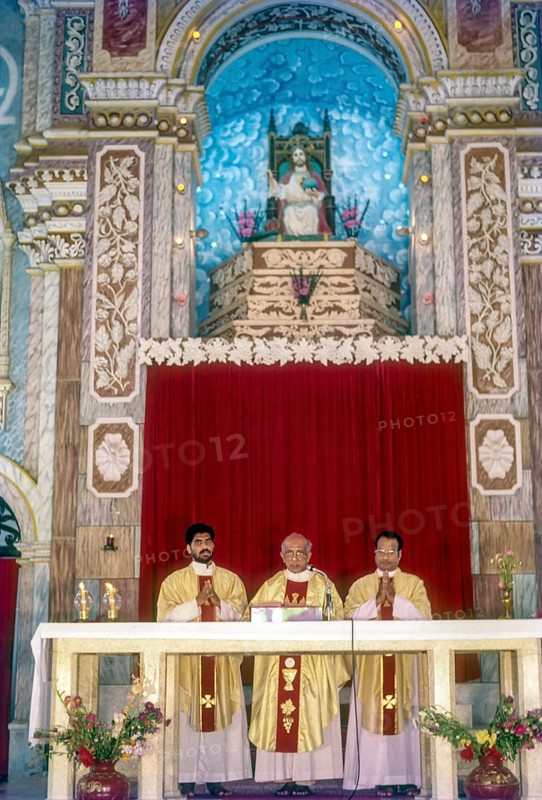 Priest preaching Santa Cruz Basilica in Fort Kochi