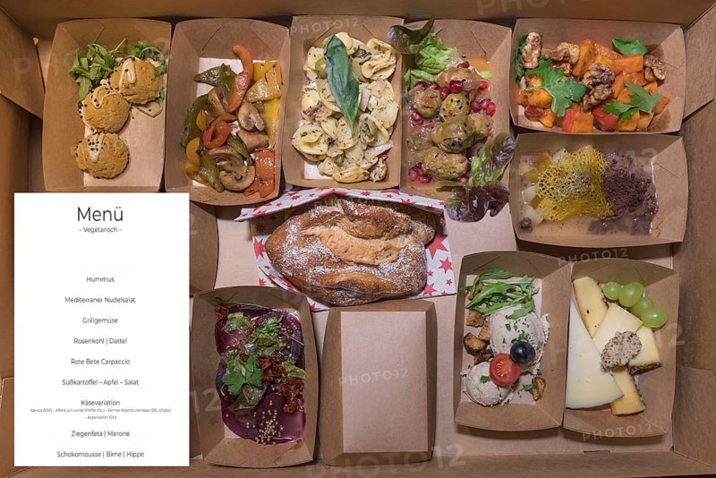 Online ordered menu with meat and vegetables delivered in boxes