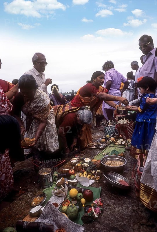 Pooja or Puja on the steps of River Kaveri or Cauvery in Srirangam
