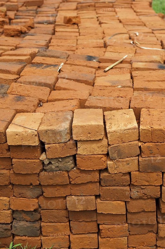 Sun-dried bricks stacked and ready for use