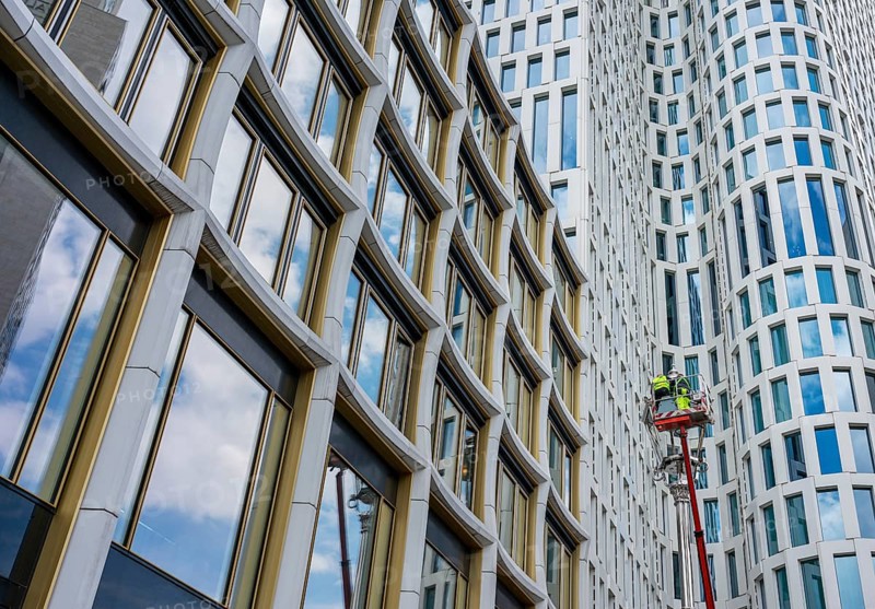 Maintenance work on the lantern in front of the Upper West high-rise