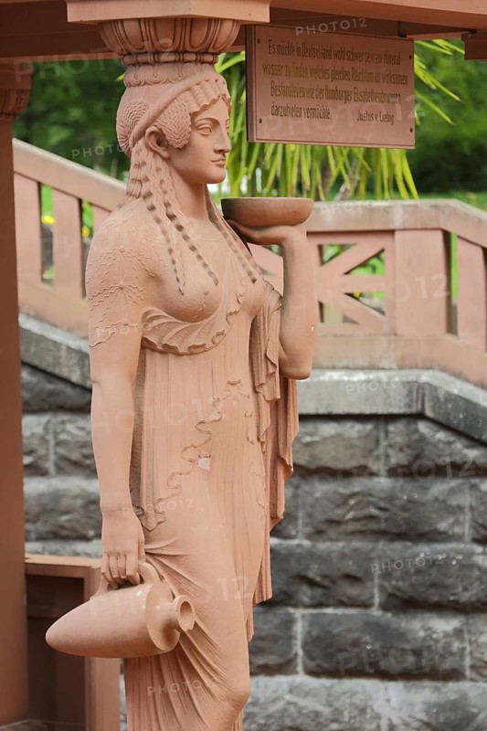 Woman figure with amphora at the Elisabethenbrunnen in the spa garden
