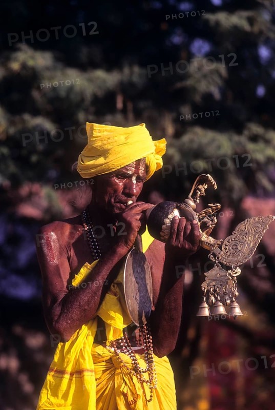 Conch blower at Nellithurai Sri Vana Badra Kali Amman Temple near Mettupalayam