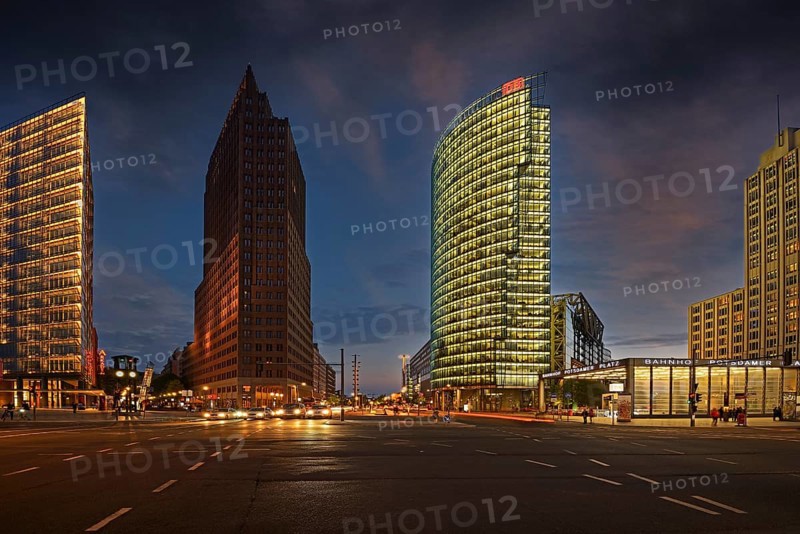 Building of the Daimler Benz area on the left and Bahntower and Beisheim-Center on the right in the evening at Potsdamer Platz