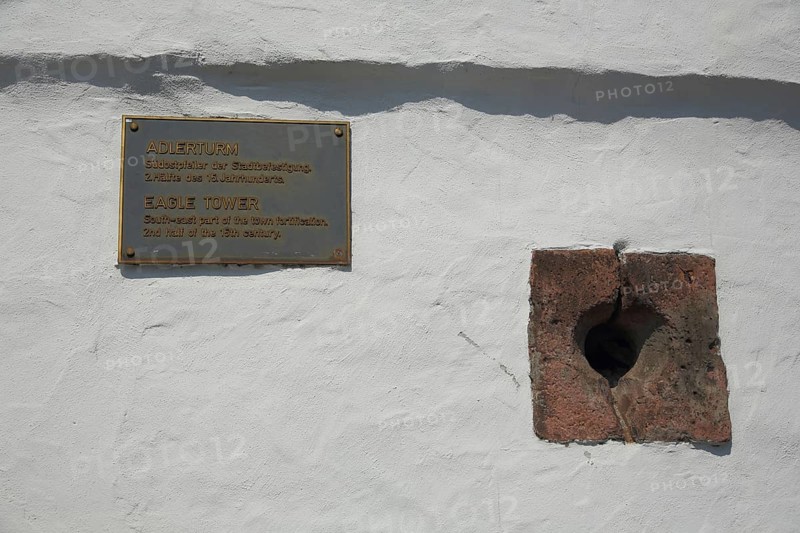 Historical information board and embrasure at the Adlerturm in Ruedesheim