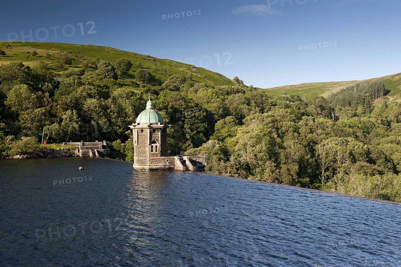 Dam spillway and pump house at reservoir