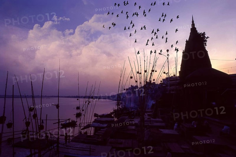 Akash deep oil Lamps in wicker baskets suspended on bamboo poles are said to be light the path of the dead to heaven at Manikarnika Ghat